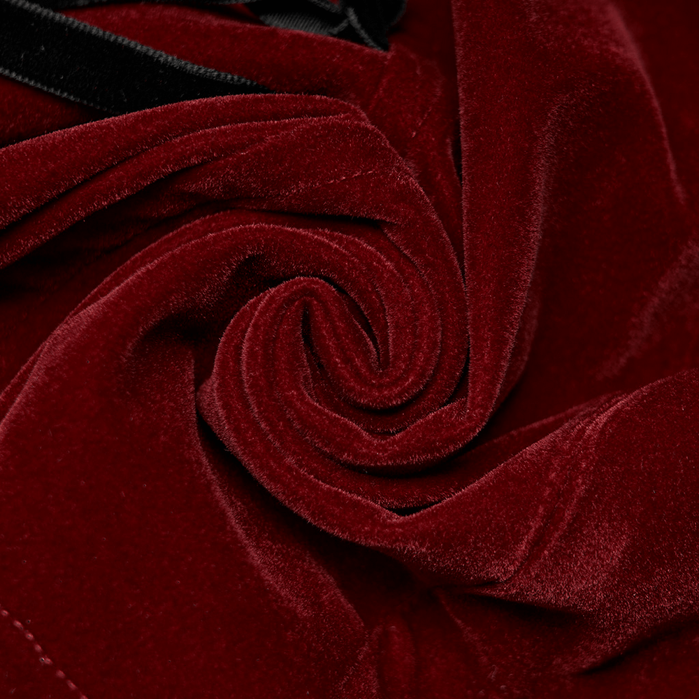 Close-up of luxurious wine red velvet fabric, showcasing its plush texture and deep color, perfect for Gothic fashion.