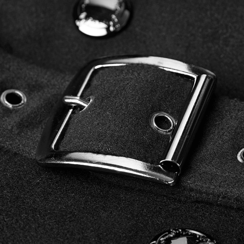 Close-up of a stylish metal buckle on a black coat, showcasing its Gothic punk design and exquisite details.