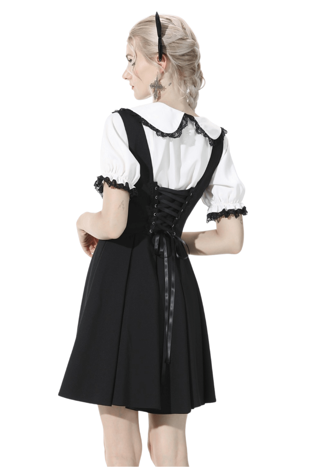 Elegant black dress featuring a stylish lace-up back and charming white collar for a chic, sophisticated look.