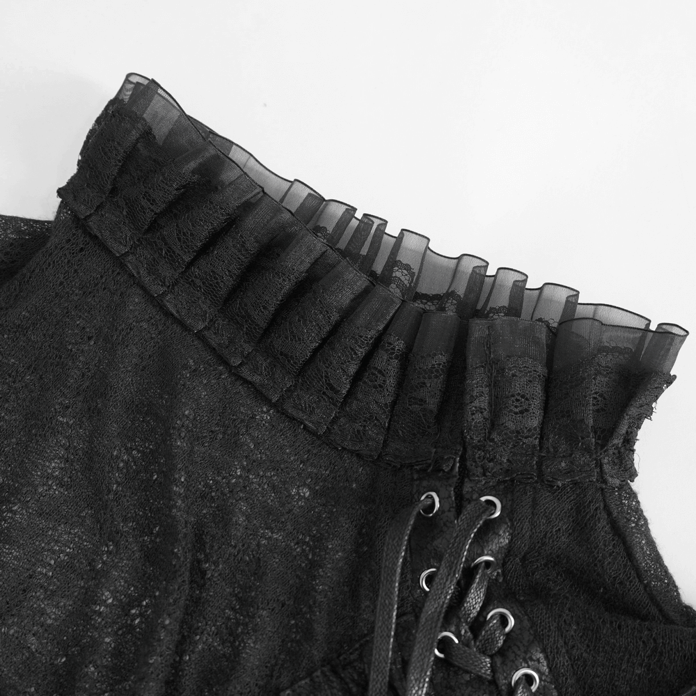 Elegant black sheer top with ruffled lace neckline and lace-up details, perfect for a stylish night out.