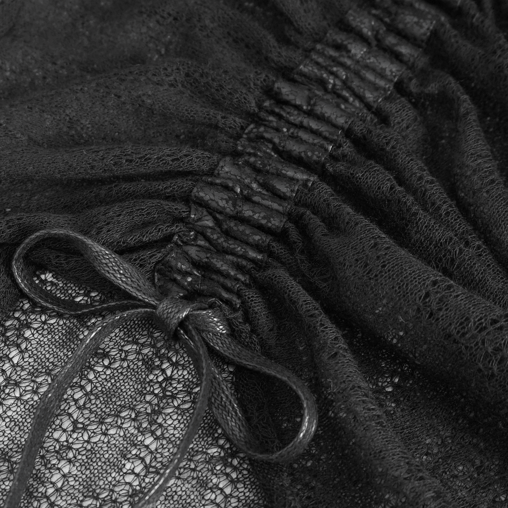 Close-up of elegant black sheer top detailing with ruffled lace and drawstring accents, perfect for stylish occasions.