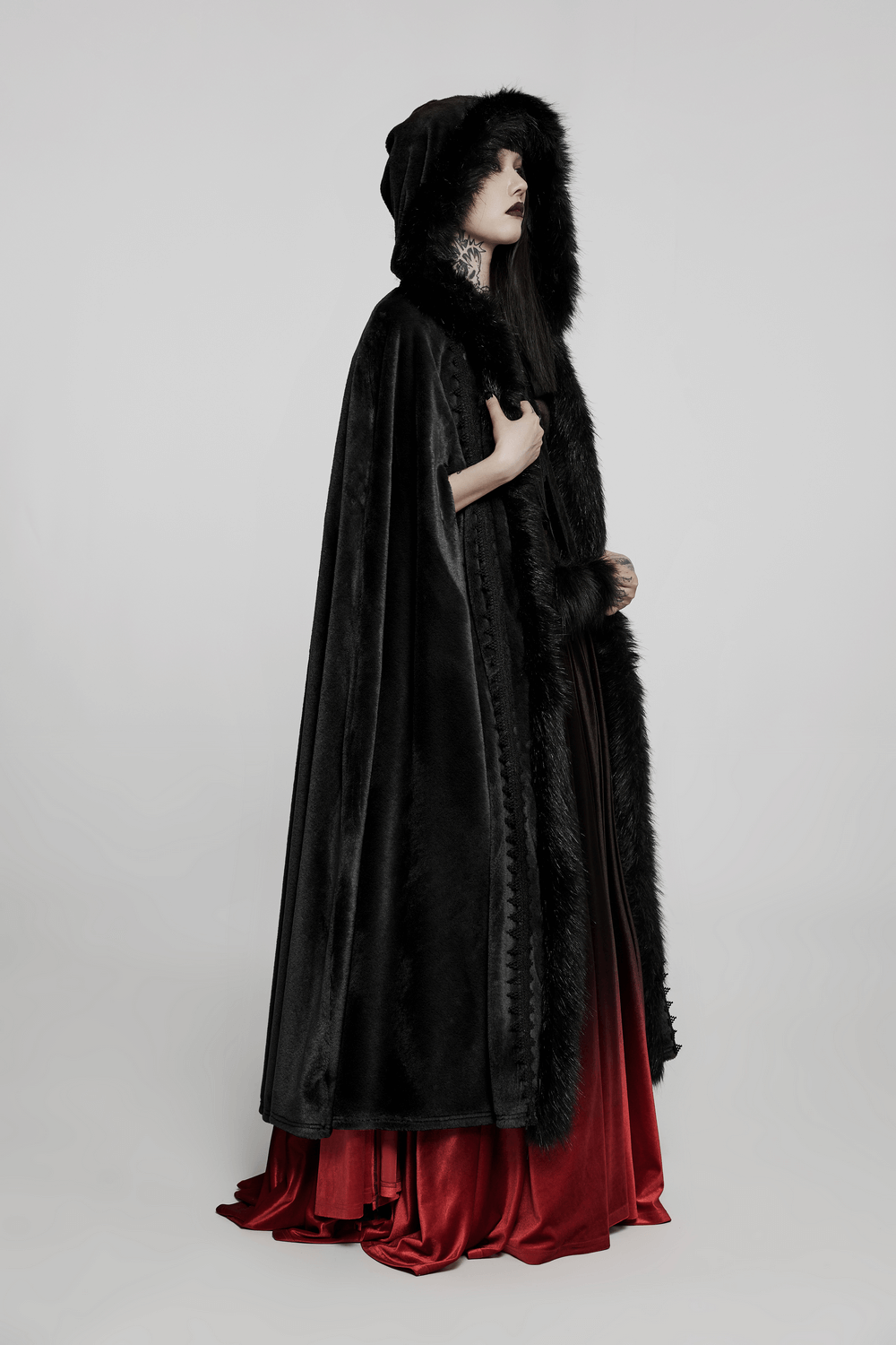 Elegant women's Gothic faux fur velvet long cloak with hood, featuring a plush red gown underneath.