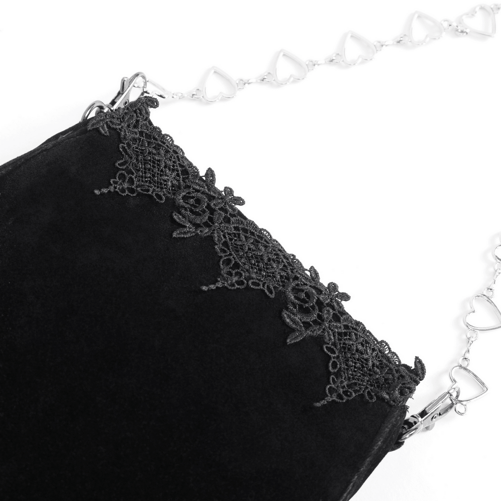 Elegant women's gothic black velvet shoulder bag with floral lace detail and silver chain strap.