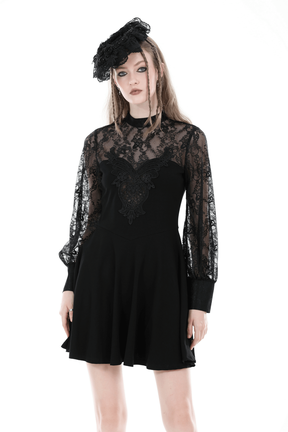 Elegant black lace dress with floral detail, featuring long sleeves and A-line silhouette, perfect for evening events.
