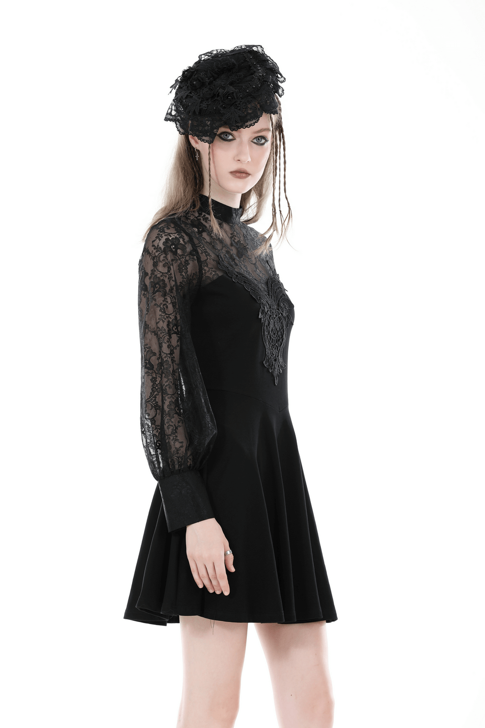 Elegant women's black lace dress with floral detail and long sleeves, perfect for evening events.