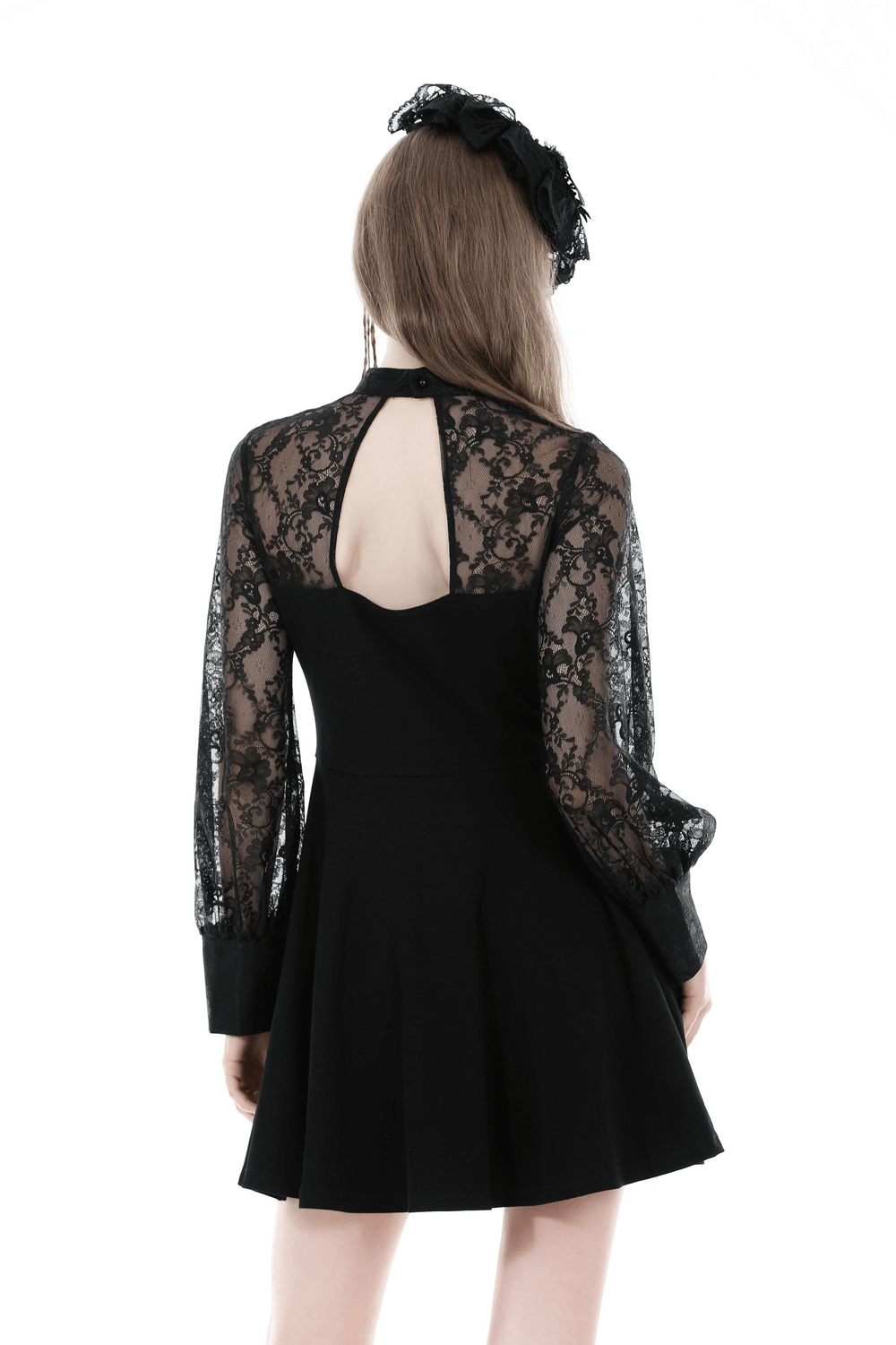 Back view of elegant black lace dress with floral detail and long sleeves, showcasing chic style perfect for evening events.