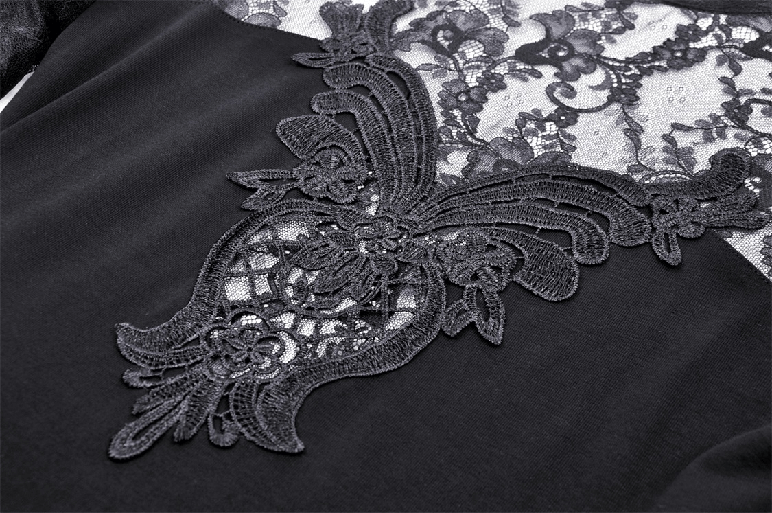 Intricate floral lace detailing on a chic black dress, showcasing elegant embroidery and modern style.