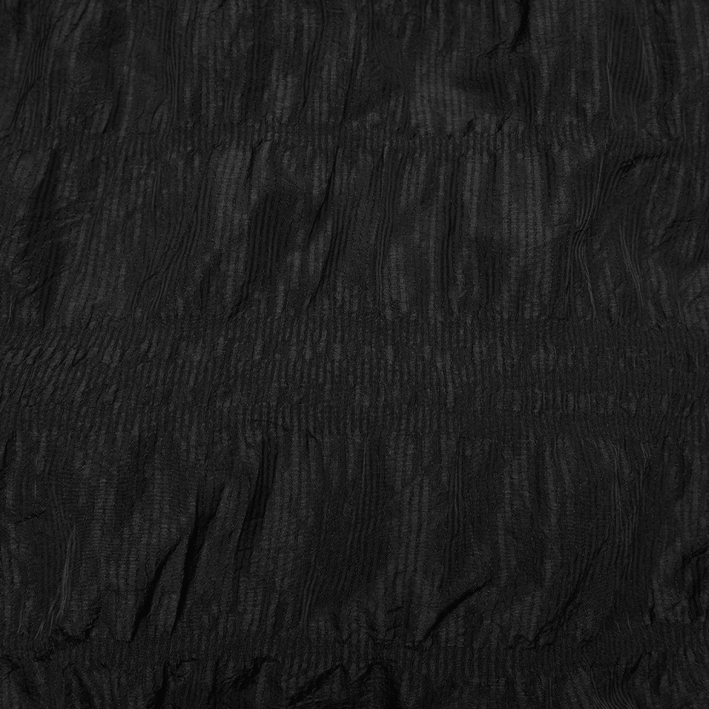Alt Tag: Elegant Women's Ruched Maxi Skirt with Layered Hem close-up of black ruched pleated fabric texture with layered ruching bands