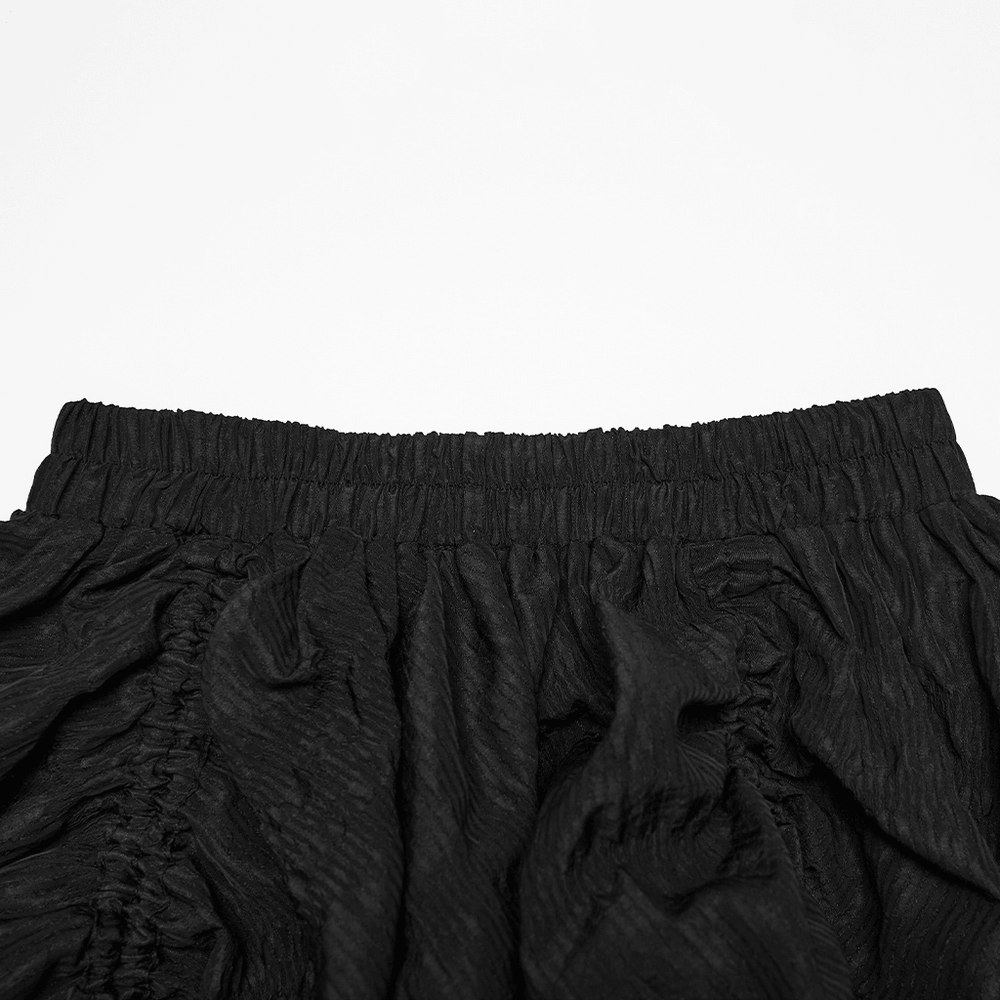 Elegant Women's Ruched Maxi Skirt with Layered Hem, black goth pleated skirt close-up with elastic waistband and ruched drawstring ruffles