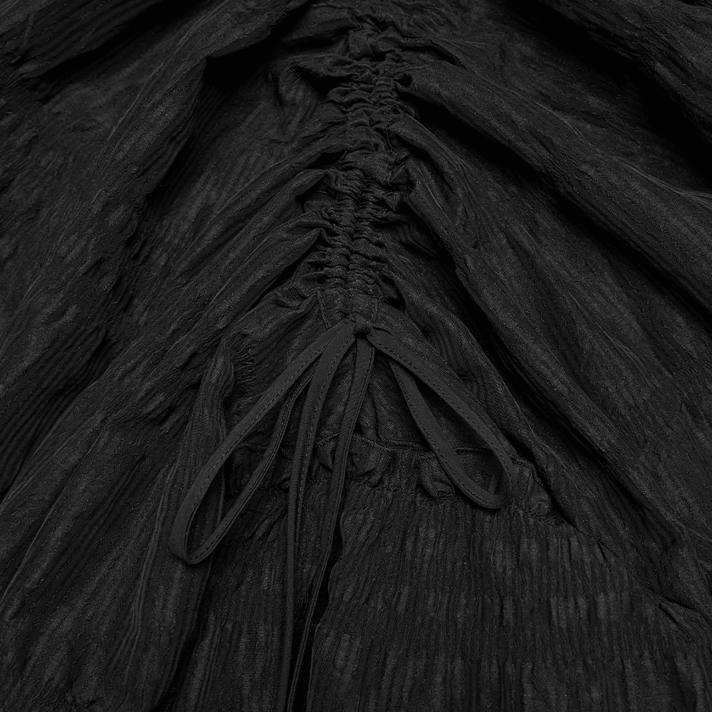 Alt Tag: Elegant Women's Ruched Maxi Skirt with Layered Hem close-up of black ruched drawstring detail and pleated fabric texture