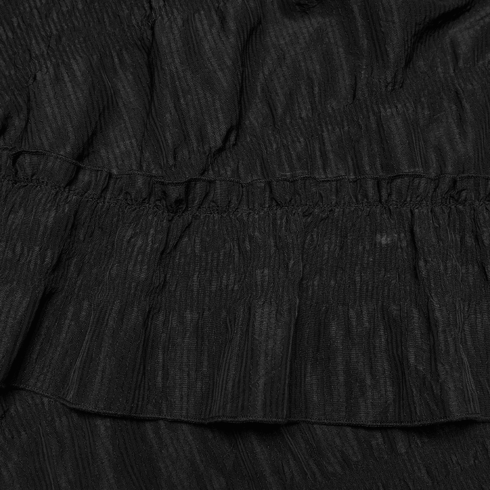 Alt Tag: Elegant Women's Ruched Maxi Skirt with Layered Hem black ruched fabric close-up with layered hem ruffles and pleated texture