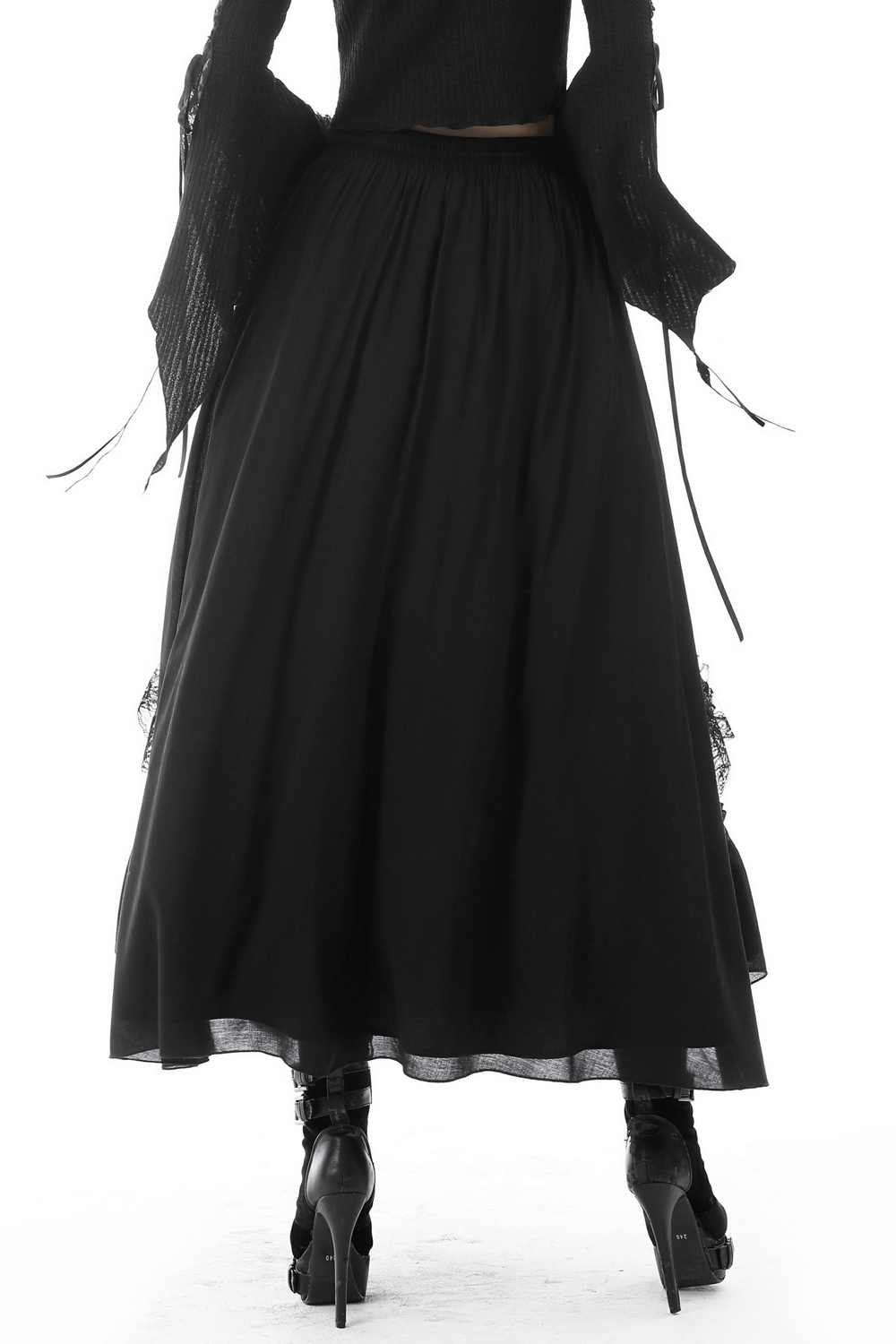 Elegant black tiered maxi skirt featuring lace detail, perfect for steampunk and dark romance styles.