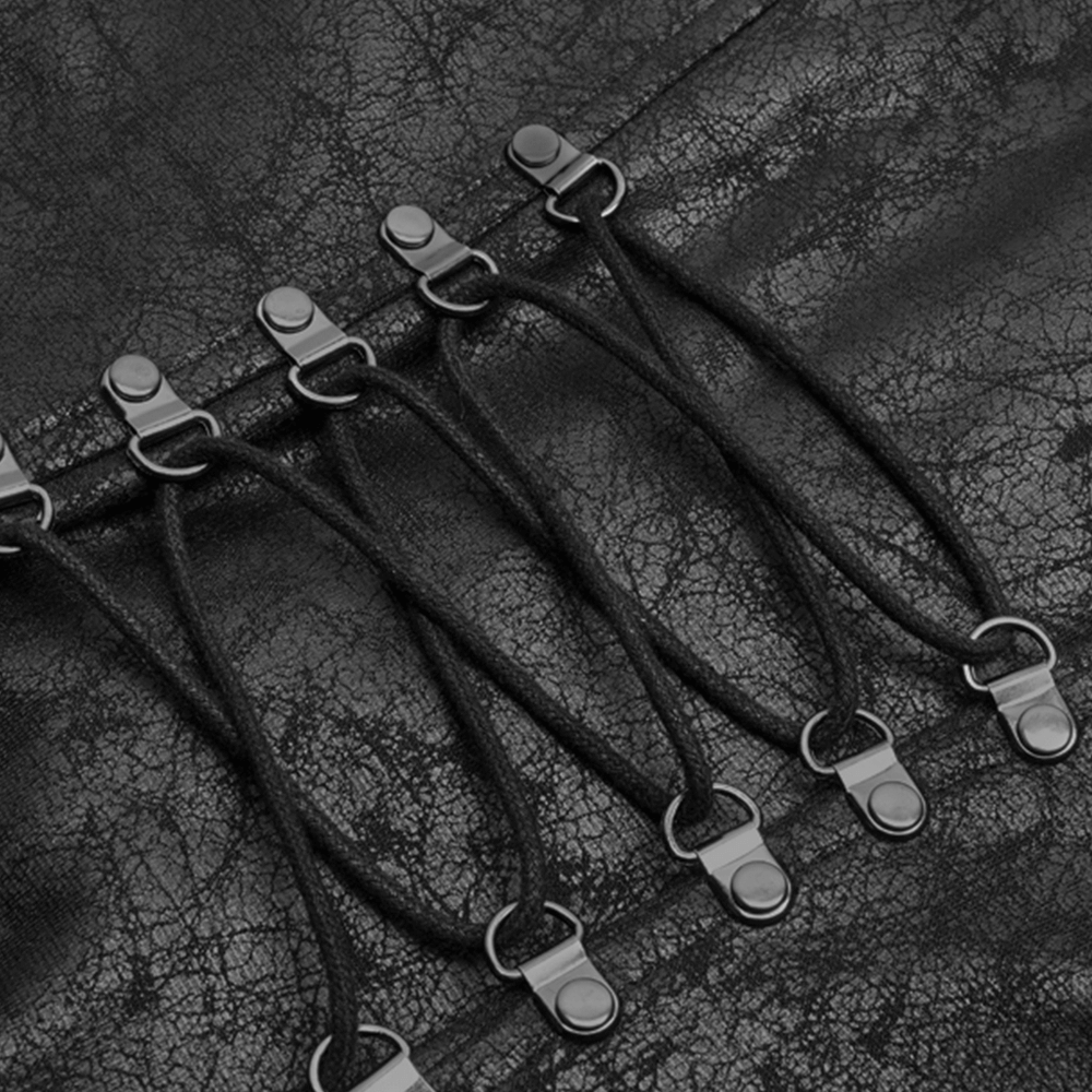 Close-up of embossed dark punk coat with intricate lacing and metallic details, showcasing unique texture and design.