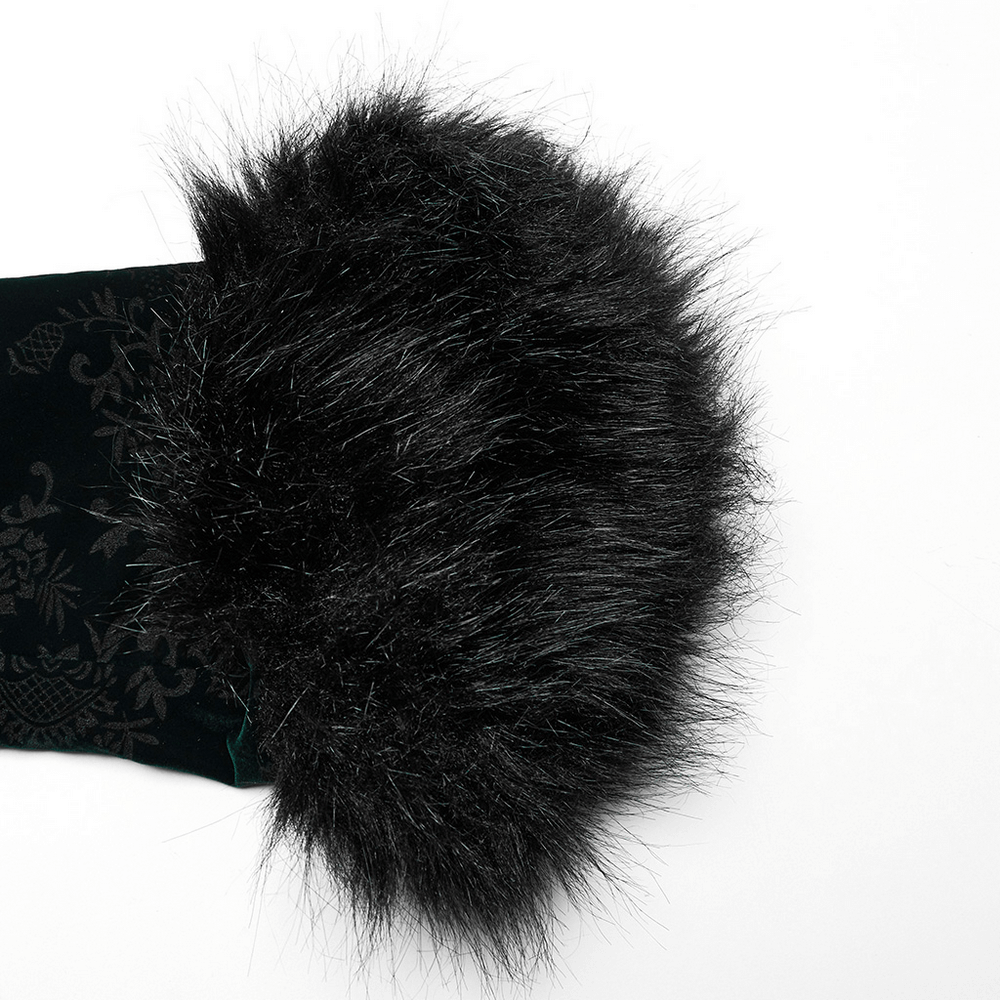 Close-up of plush black fur trim on an embossed velvet goth jacket, highlighting luxurious texture and detail.