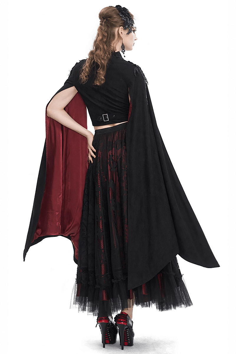 Back view of a gothic women's top with flared sleeves and striking red details, paired with a black skirt.