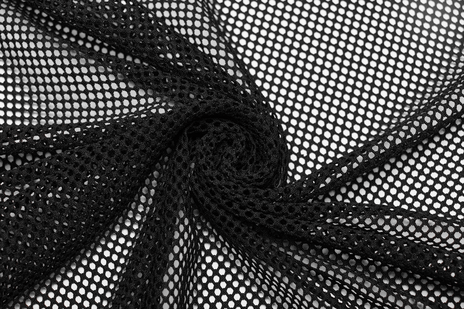 Black mesh fabric with a twisted pattern showcasing its breathable and stylish design.