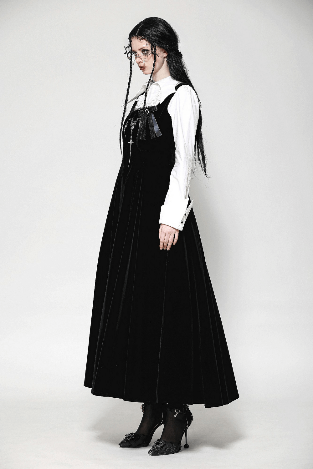 Gothic black long dress with lace-up back, stylish velvet fabric, perfect for any elegant event.