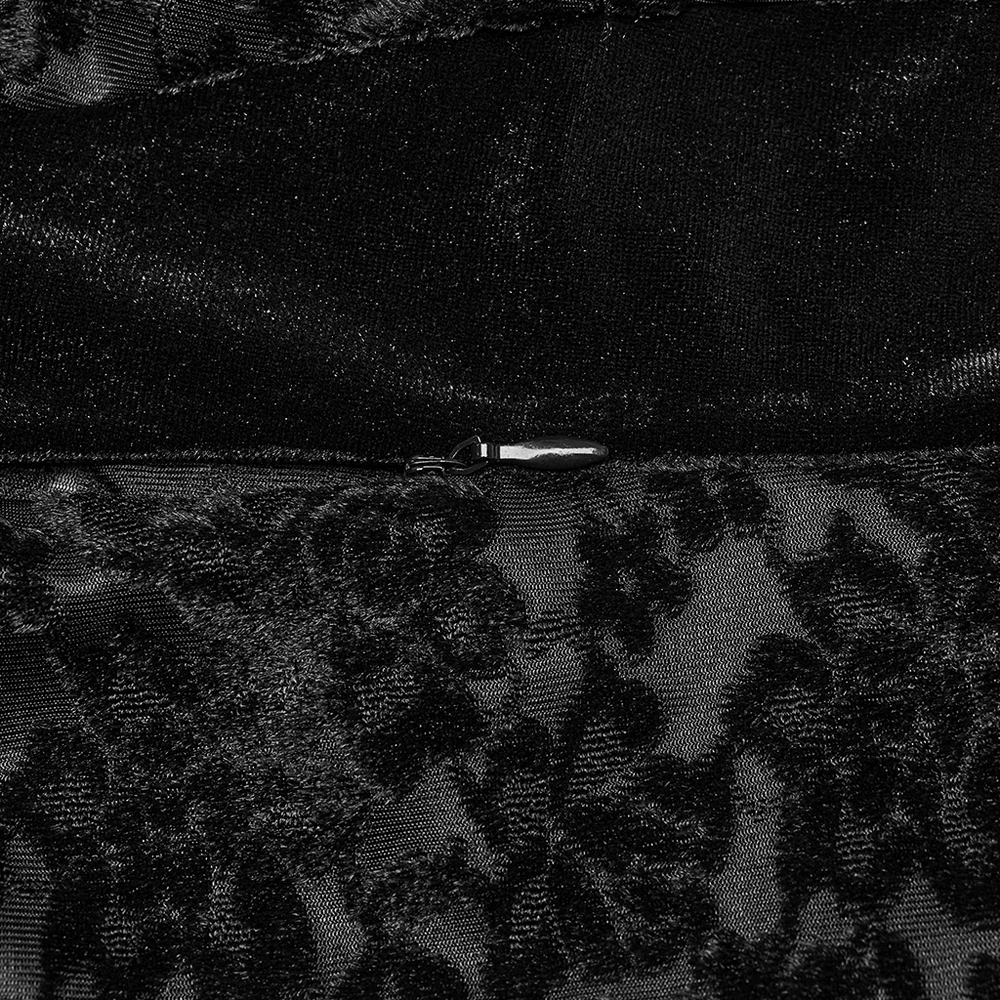 Close-up of elegant dark lace fabric with a zipper detail, showcasing the gothic dress's luxurious texture and design.