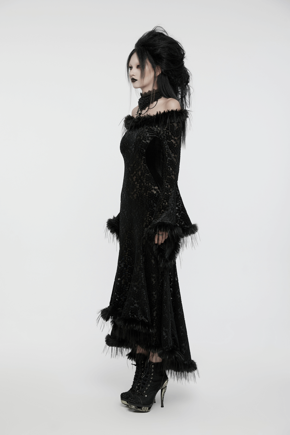 Enchanting gothic dress with fur-trimmed bell sleeves and black velvet accents, showcasing dark romance elegance.
