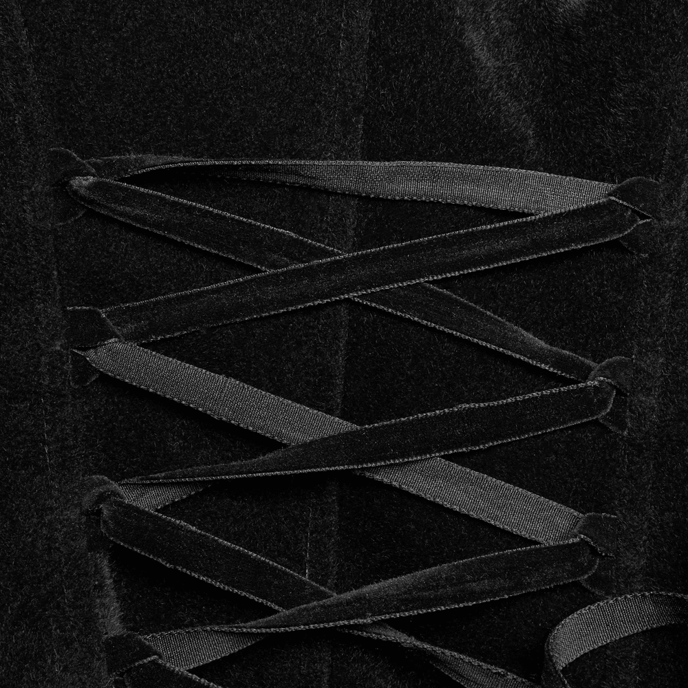 Close-up of lace-up back detailing on gothic vintage velvet coat, showcasing luxurious black fabric and elegant design.