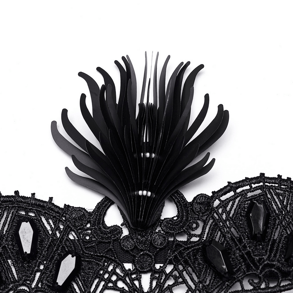 Close-up of a gothic lace eye mask featuring intricate black lace and a striking 3D black pteris detail.