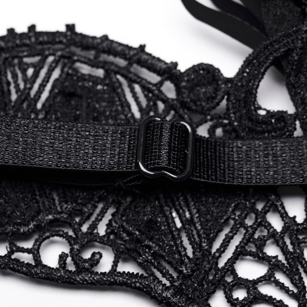 Detailed view of gothic lace eye mask with intricate design and coffin-shaped buckle for a mysterious look.