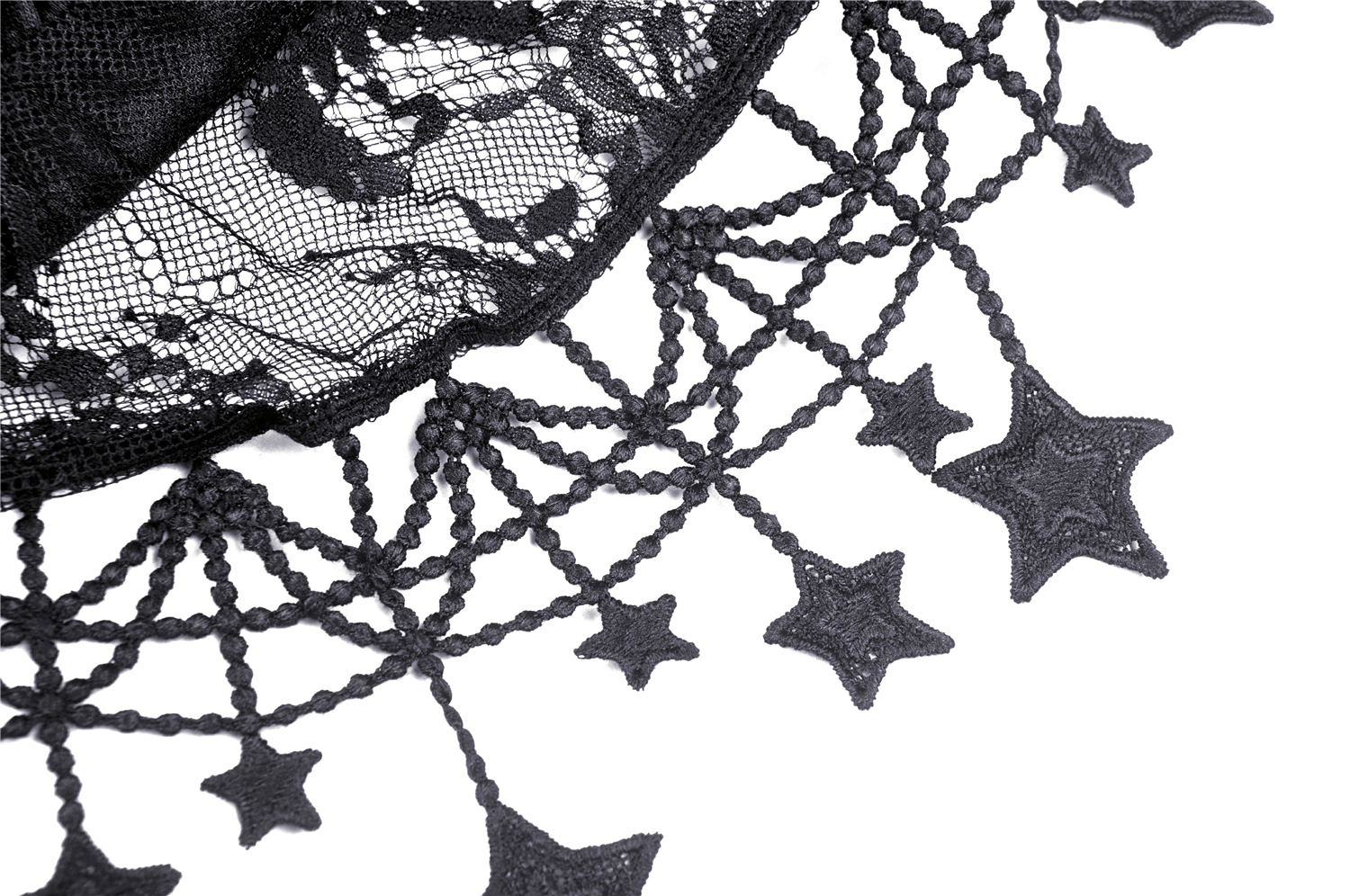 Close-up of delicate lace trim featuring black star tassels, perfect for gothic costumes and enchanting styles.