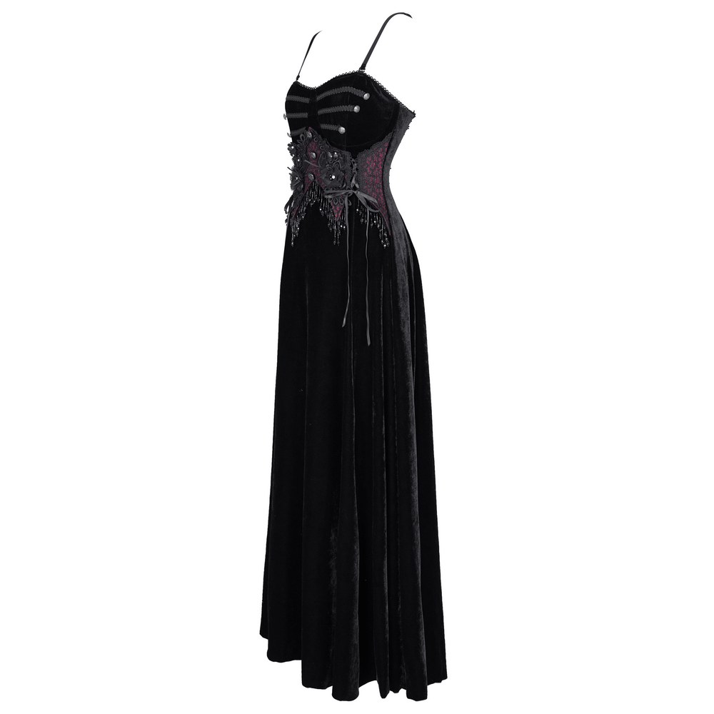 Enchanting black velvet maxi dress with beaded lace appliques and adjustable spaghetti straps.