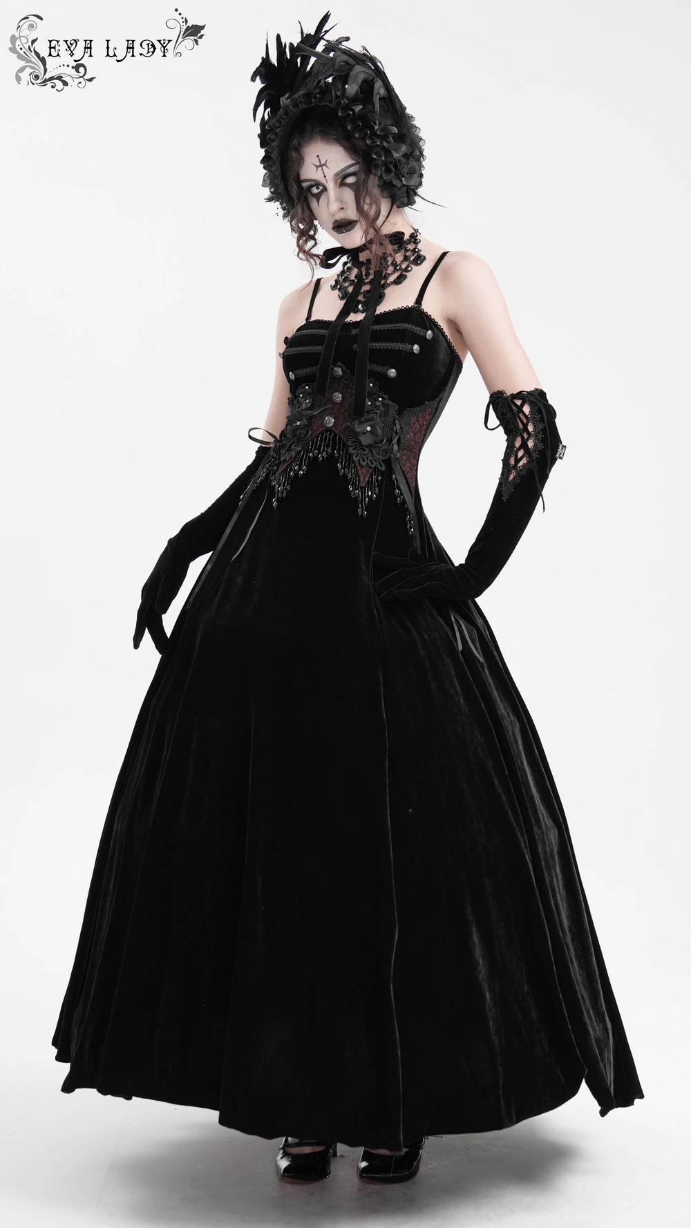 Enchanting black velvet maxi dress with beaded lace accents, perfect for gothic and alternative fashion.