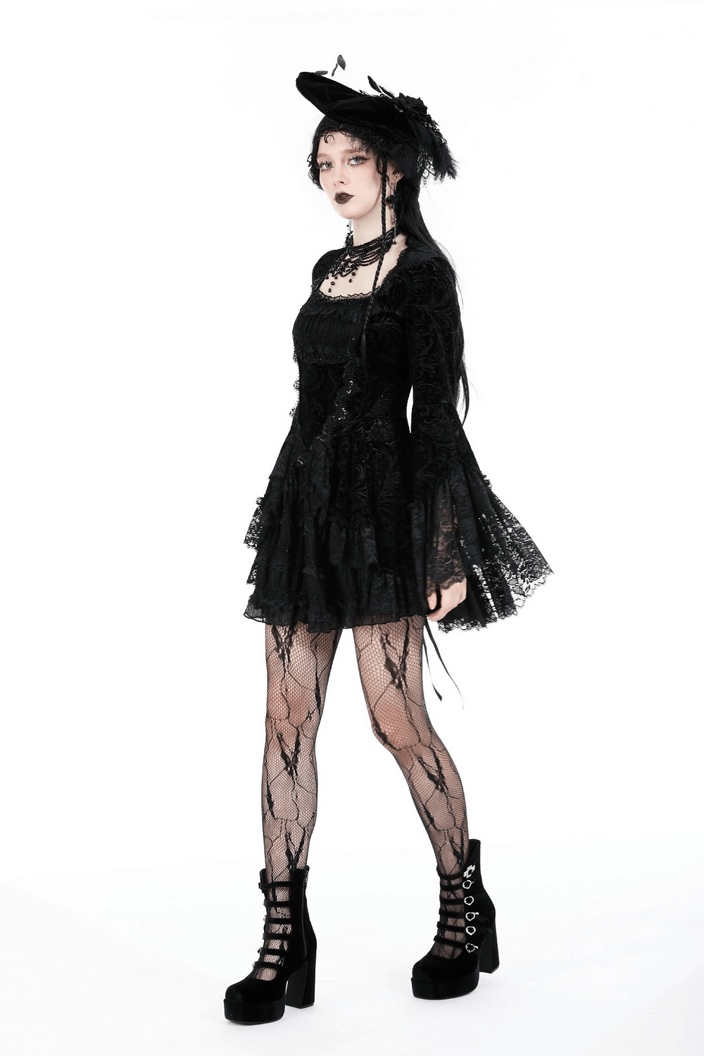 Elegant Gothic dress with lace trim, paired with striking accessories for dark romantic vibes.