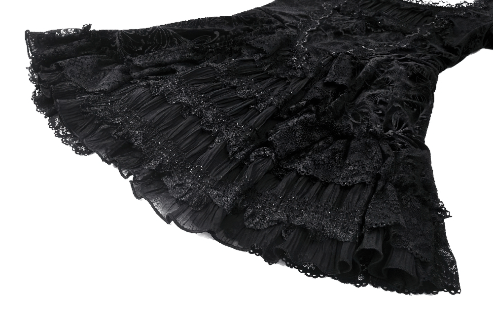 Elegant black lace gown with intricate ruffles and vintage detailing, perfect for gothic fashion lovers.