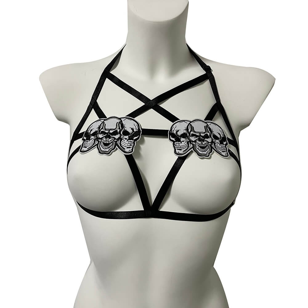 Gothic cupless body harness with skull accents, perfect for bold and daring women. Ideal for a seductive gothic look.