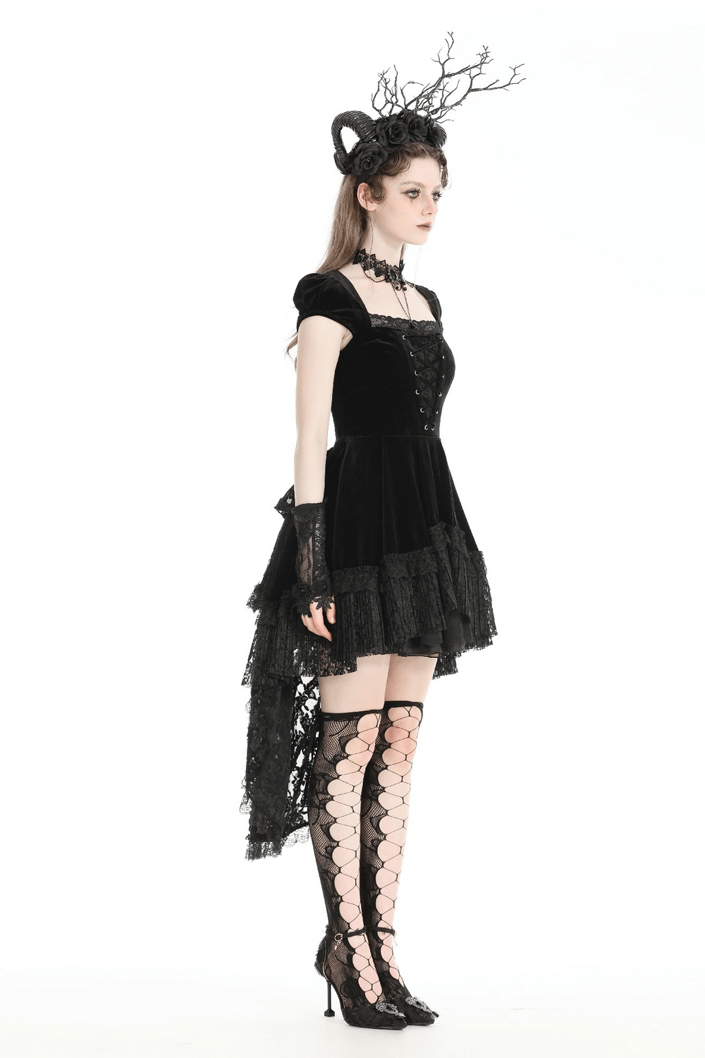 Elegant gothic dress featuring lace overlay, swallowtail hem, and stylish accessories for a dramatic look.