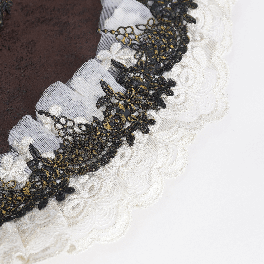 Close-up of intricate lace and ribbon detailing on a Victorian tricorn hat, showcasing elegance and craftsmanship.