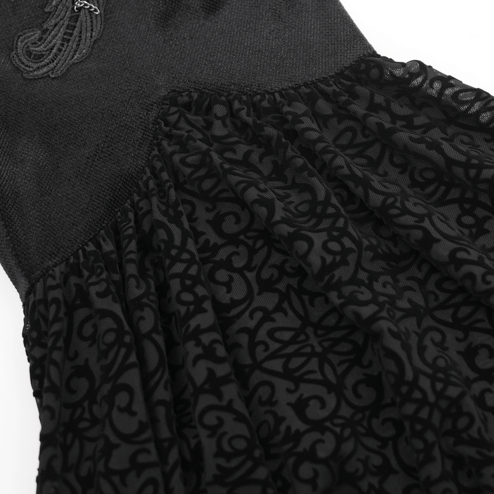 Elegant black lace palazzo pants showcasing intricate patterns and stunning chain detailing for a gothic-inspired look.