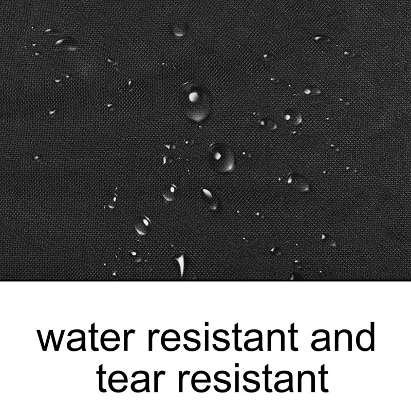 Close-up of water droplets on a black fabric showcasing water and tear resistance features.