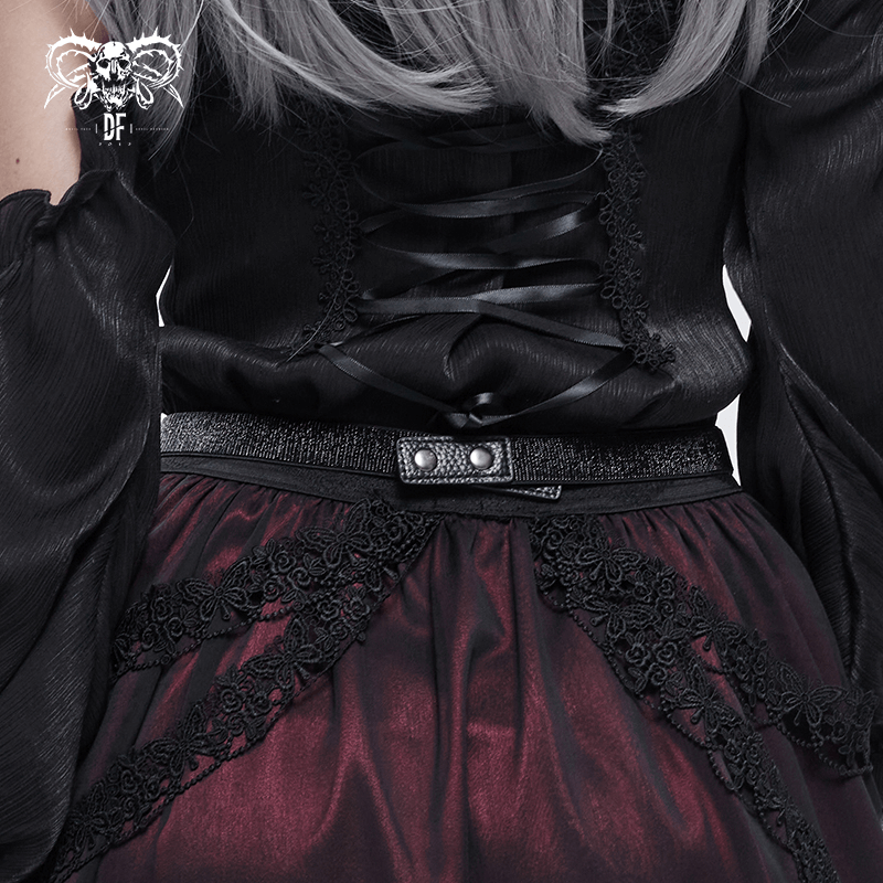 Elegant women's punk outfit featuring a black crystal belt paired with a gothic lace-up blouse.
