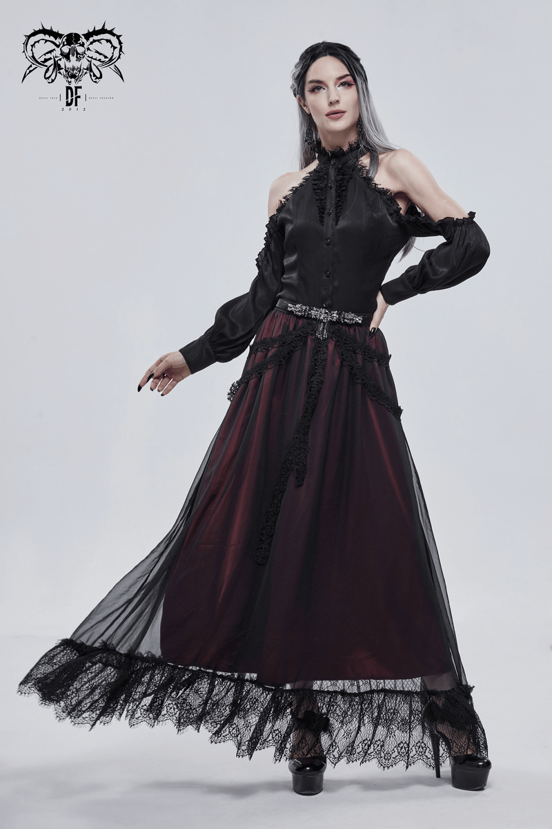 Gothic punk style woman in a black and burgundy dress with lace details, showcasing elegance and attitude.