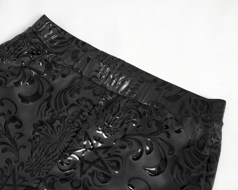 Close-up of black floral and pentagram pattern leggings showcasing sleek gothic style details.