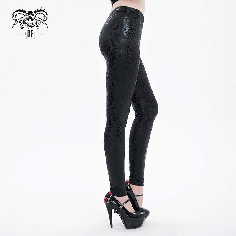 Gothic style women's leggings in black with intricate floral patterns, paired with edgy high heels.