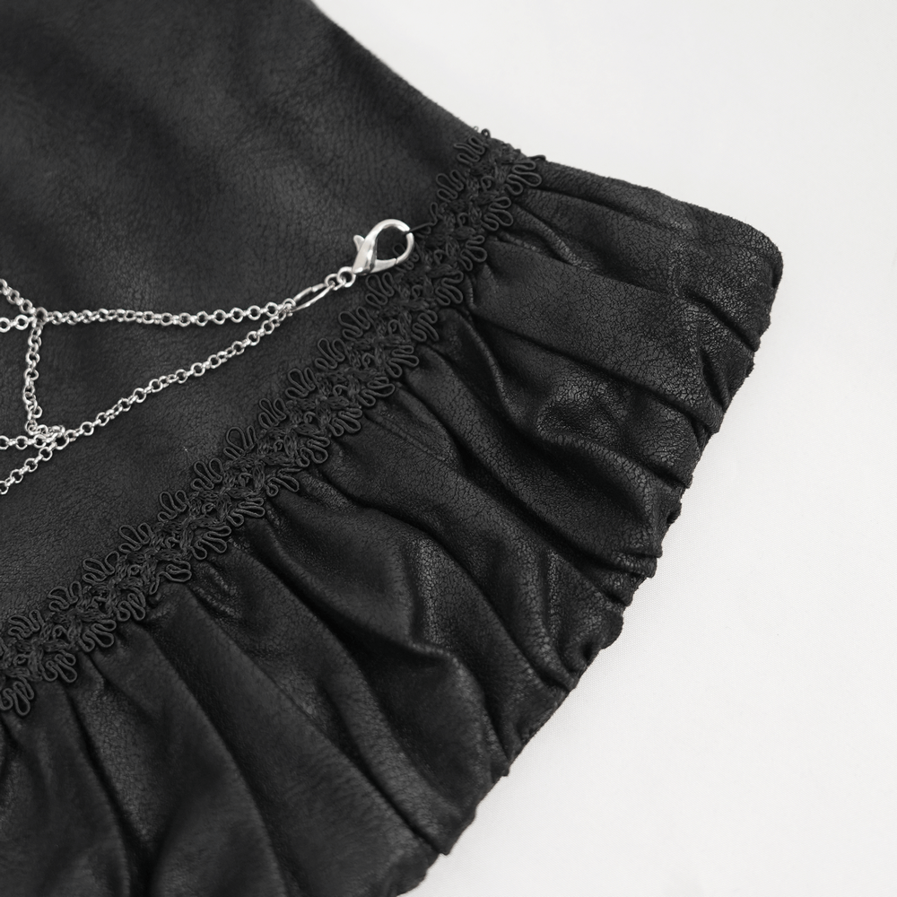 Close-up of the ruffled hem and chain detail on a Black Spider Web Gothic Skirt, showcasing gothic elegance and style.