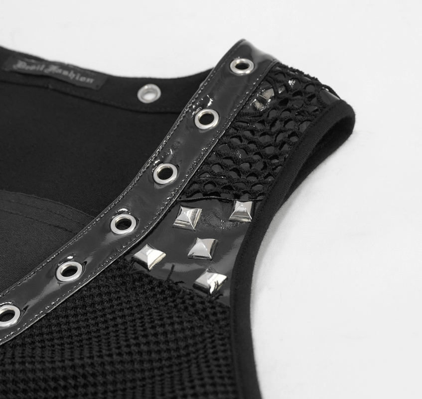 Close-up of a women's black punk-style vest featuring silver rivets and mesh detailing.