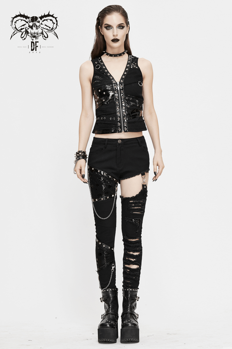 Stylish model in a black sleeveless zipper vest paired with ripped pants and chunky boots, showcasing women's punk fashion.