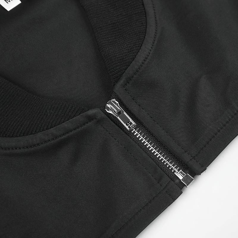 Close-up of black zipper on a cropped top, showcasing punk style and unique design details.