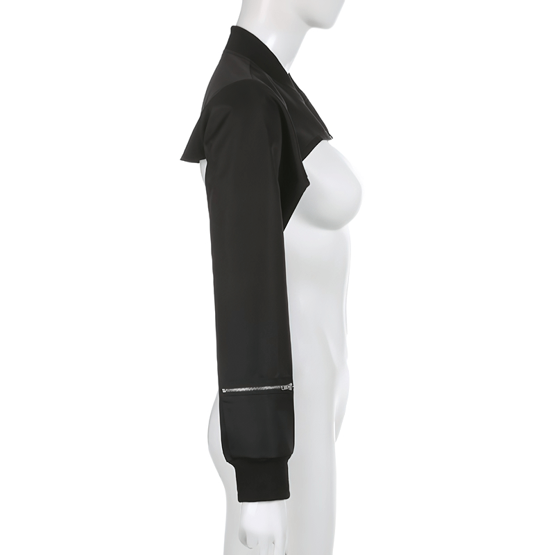 Side view of a stylish black cropped top with unique pockets and zipper details, perfect for punk fashion.