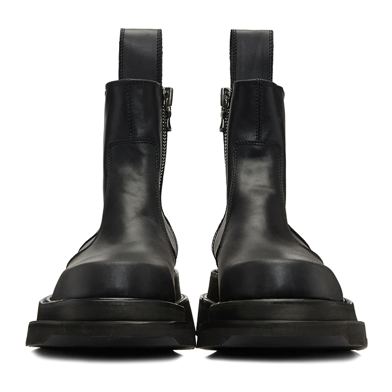 Stylish men's black fashion boots with thick heels and side zippers for casual comfort.