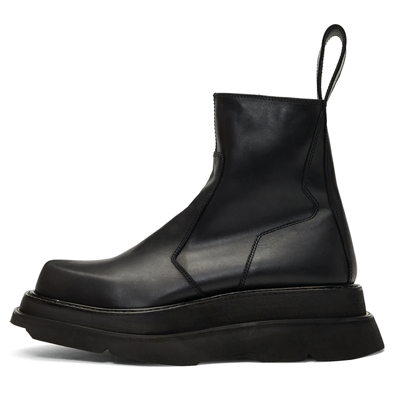 Men's black fashion boots with thick heel, modern design and side zipper for comfort.