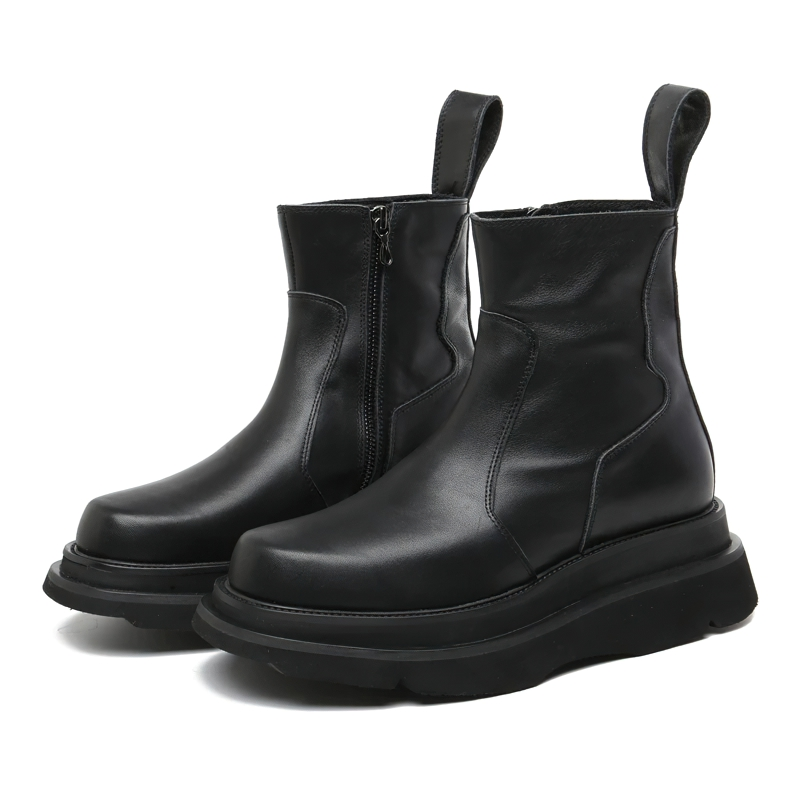 Men's black fashion boots with thick heels and side zipper for comfort, designed in casual style.