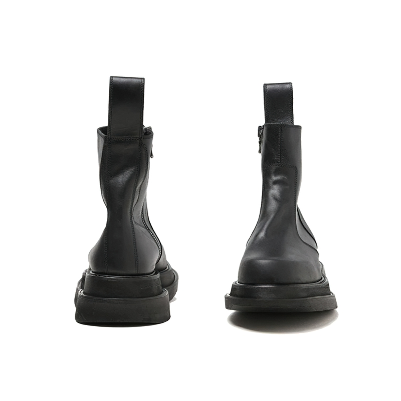 Men's black fashion boots with thick heel and side zipper for comfort, featuring a sleek modern design.