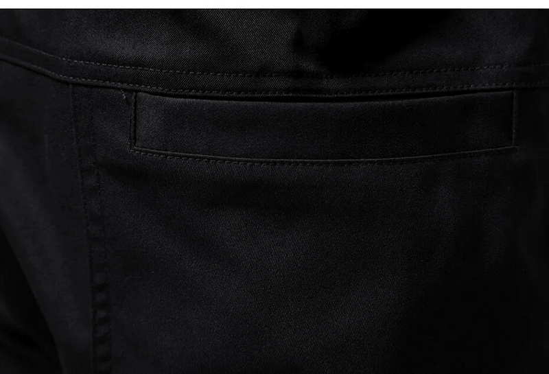 Close-up of black cotton cargo pants pocket, showcasing style and functionality for men's fashion.
